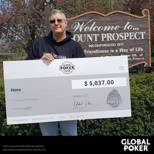 John “Hoss” K. holding a cheque for $5037