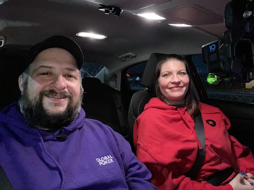 “Ldmariodl28” in his exclusive, purple, Home Game hoodie, with his wife, filming content for their YouTube channel.
